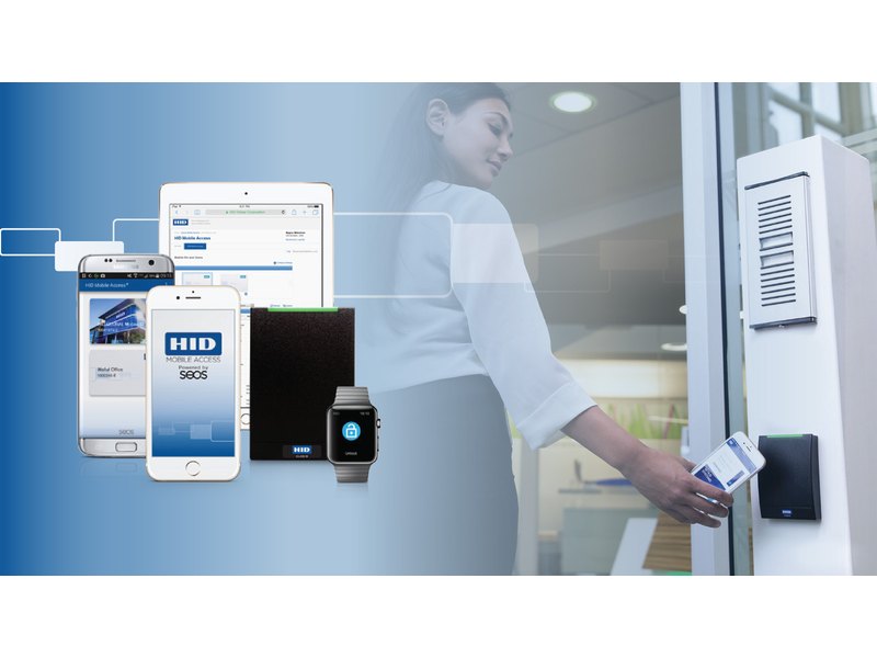 Employee using HID Mobile Access smartphone credential to unlock a commercial door - HID Global installation by Michigan Security Systems, authorized HID Global dealer serving Michigan, Ohio and Indiana
