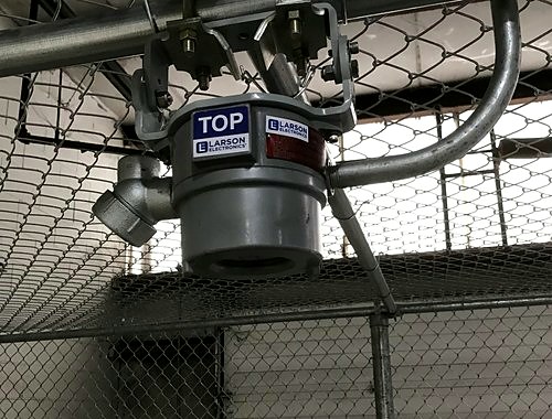 Installing an explosion-proof camera cage — Michigan Security Systems