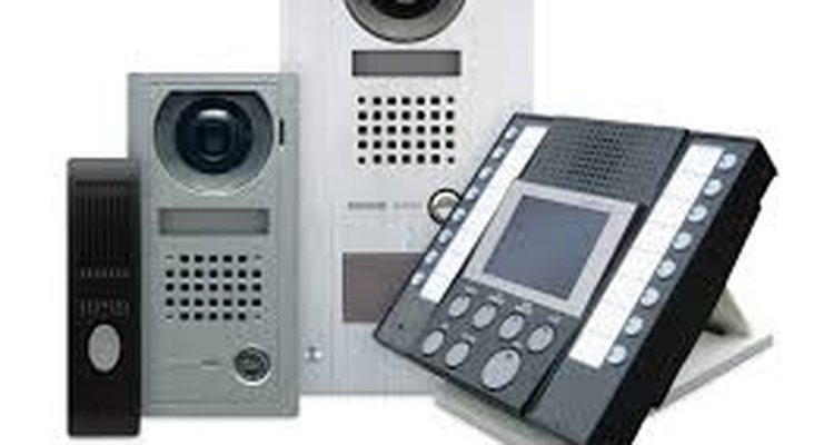 Aiphone AX Series video intercom door stations and master monitor shown together — installed by Michigan Security Systems across Michigan, Ohio and Indiana