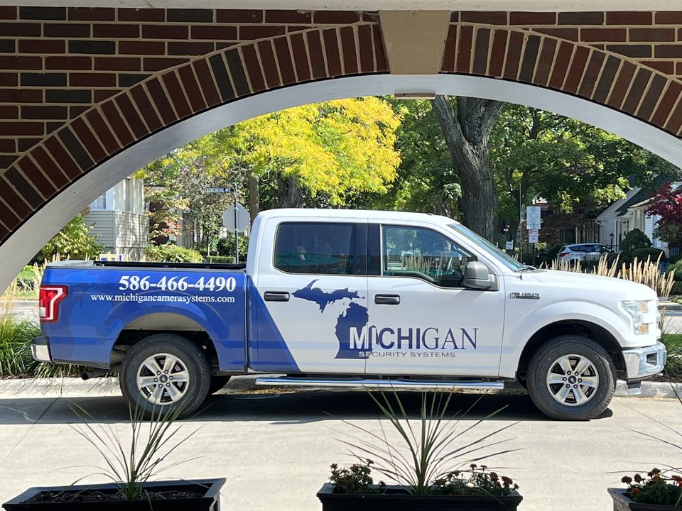 Michigan Security Systems work truck - commercial security camera installation crew in Michigan