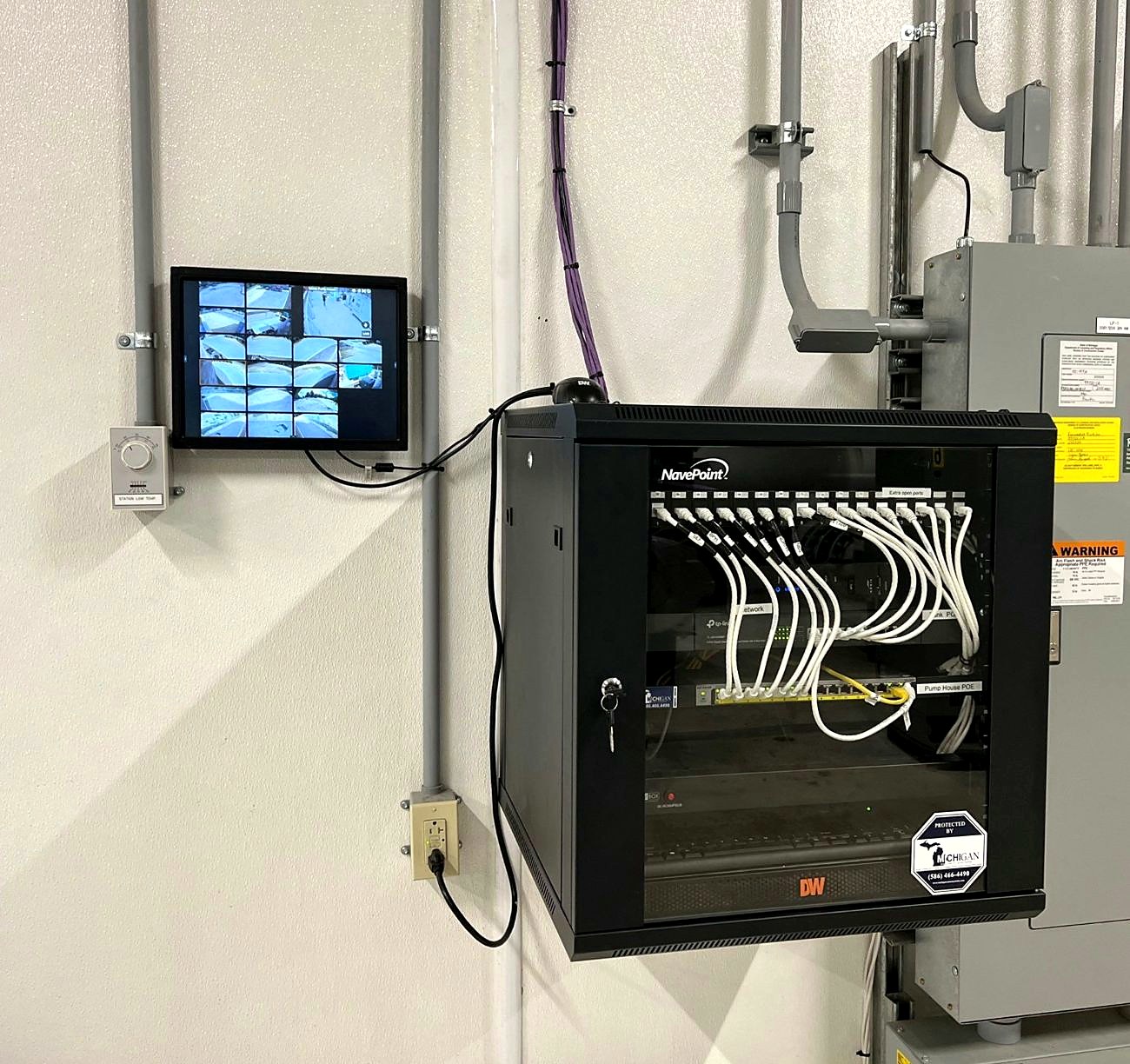 Network rack Altronix power supply Cat6 structured cabling installation Mount Clemens Michigan — commercial low-voltage cabling contractor Macomb County — Michigan Security Systems