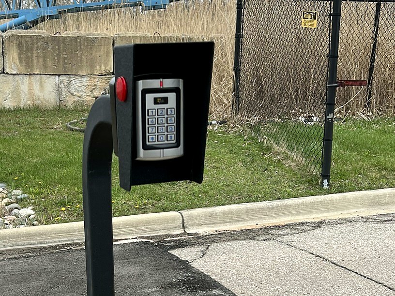 Outdoor gate access control keypad on post Michigan — Michigan Security Systems