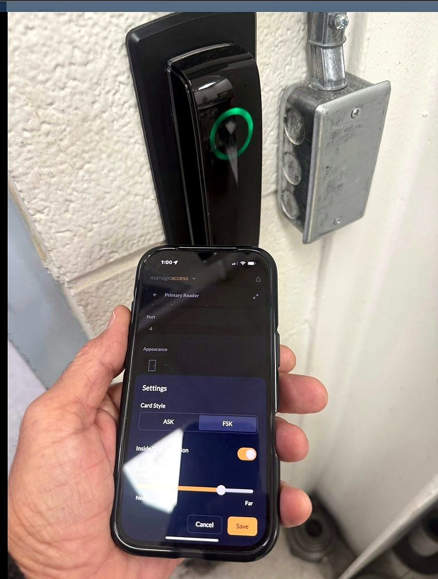 PDK access control reader with green ready ring and the PDK manageaccess app configuring the Primary Reader at the J.G. Kern Enterprises automotive plant in Sterling Heights, Michigan