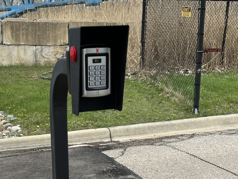 Outdoor gate access control keypad on post Michigan — Michigan Security Systems