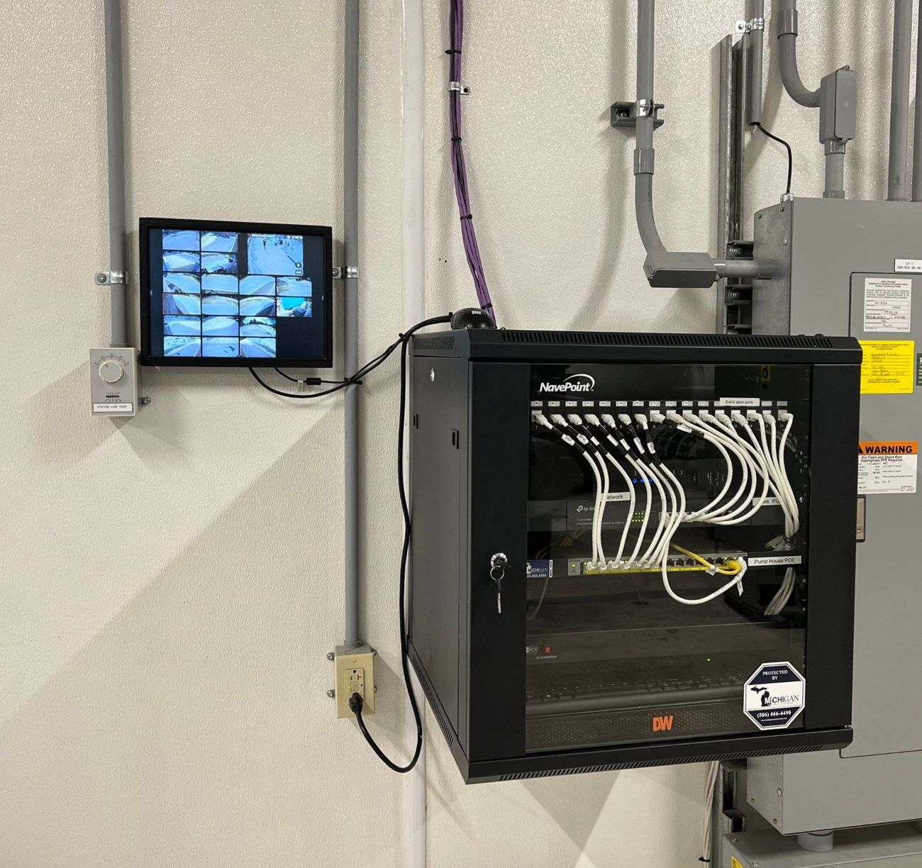 Network rack Altronix power supply Cat6 structured cabling installation Romulus Michigan — commercial low-voltage cabling contractor Wayne County — Michigan Security Systems