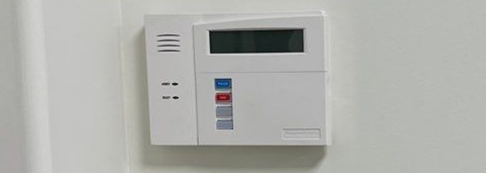 Resideo commercial alarm panel and Alarm.com installation — Michigan Security Systems commercial alarm systems