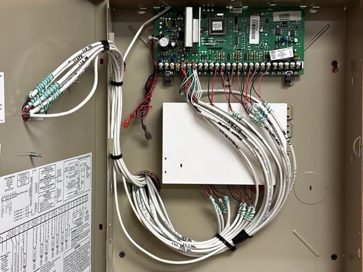 Resideo commercial alarm panel wiring installation with Alarm.com integration Romulus Michigan — professional commercial alarm system installer Wayne County — Michigan Security Systems