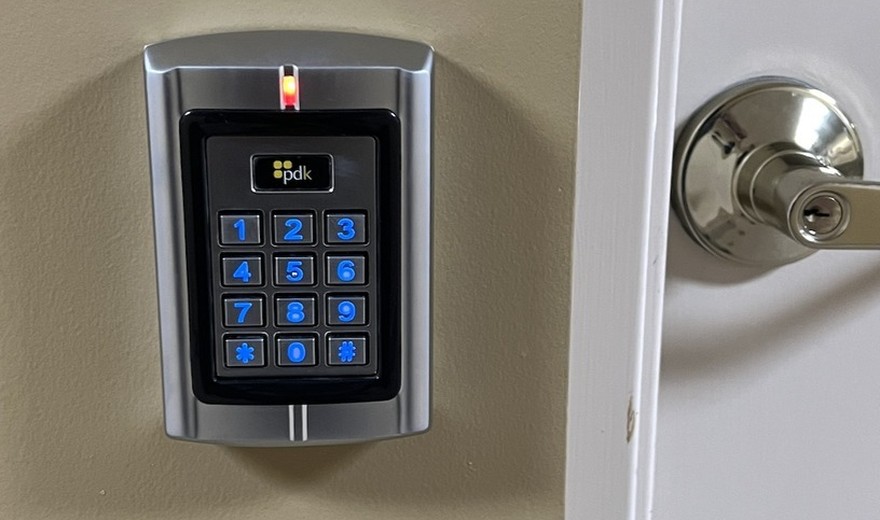 PDK RFID card reader & keypad on a commercial door — Michigan Security Systems