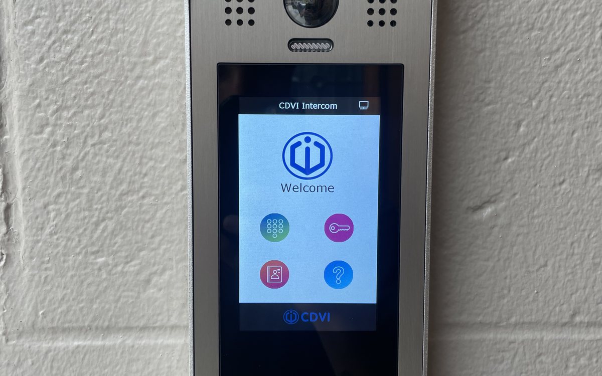 Video intercom panel at a multifamily apartment building entrance — Michigan Security Systems