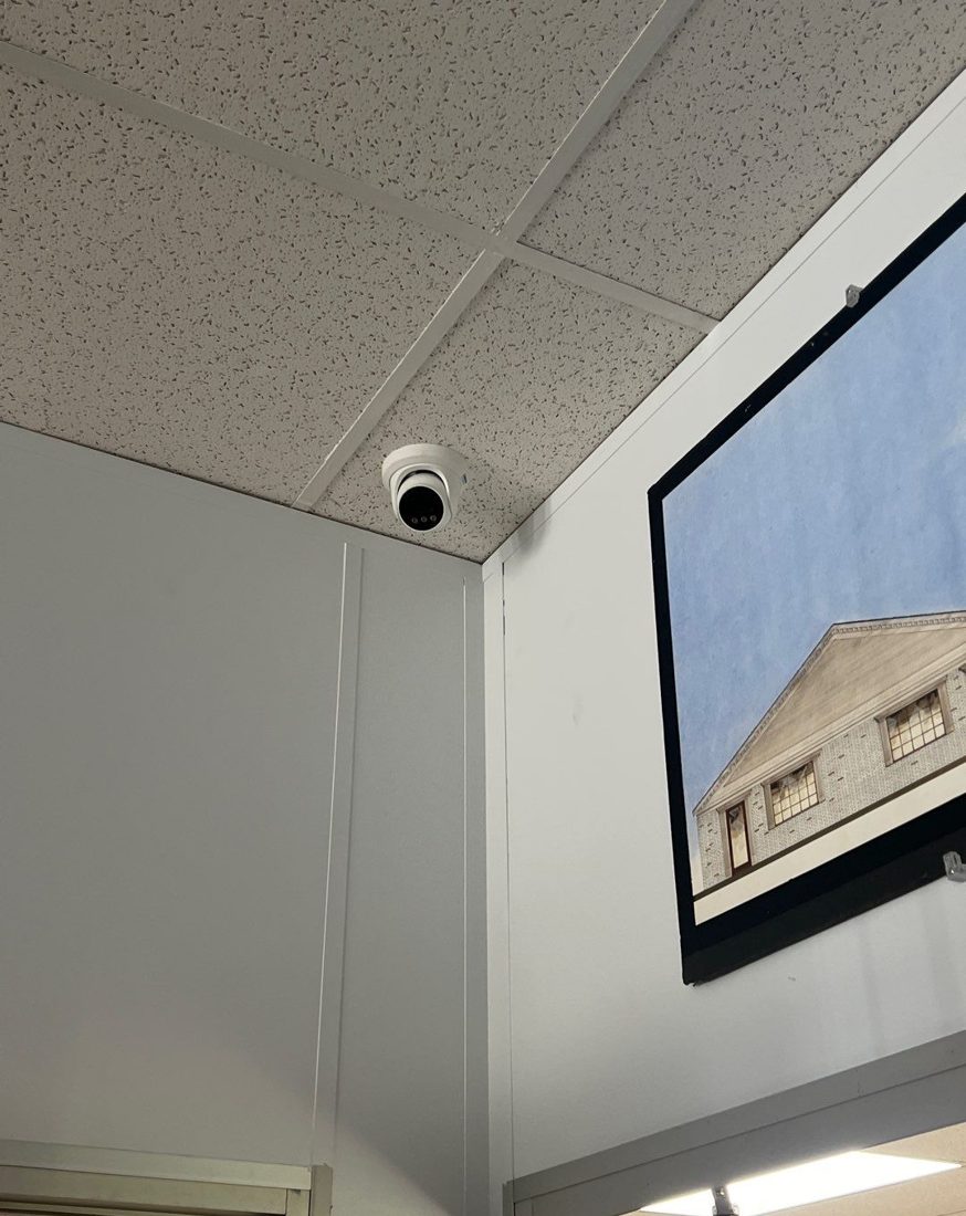Ceiling-mounted turret dome security camera covering the lobby and entrance area at the Best Western hotel in Port Huron, Michigan, installed by Michigan Security Systems