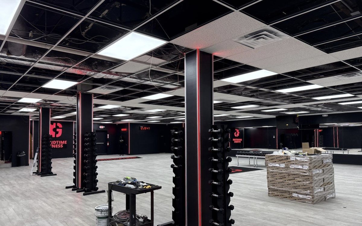 Security camera covering a fitness-center workout floor — Michigan Security Systems