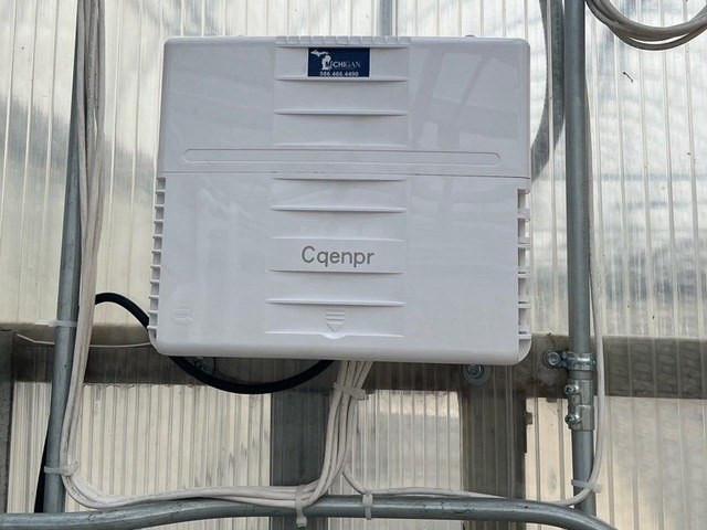 PoE outdoor all-weather network switch at a greenhouse — Michigan Security Systems