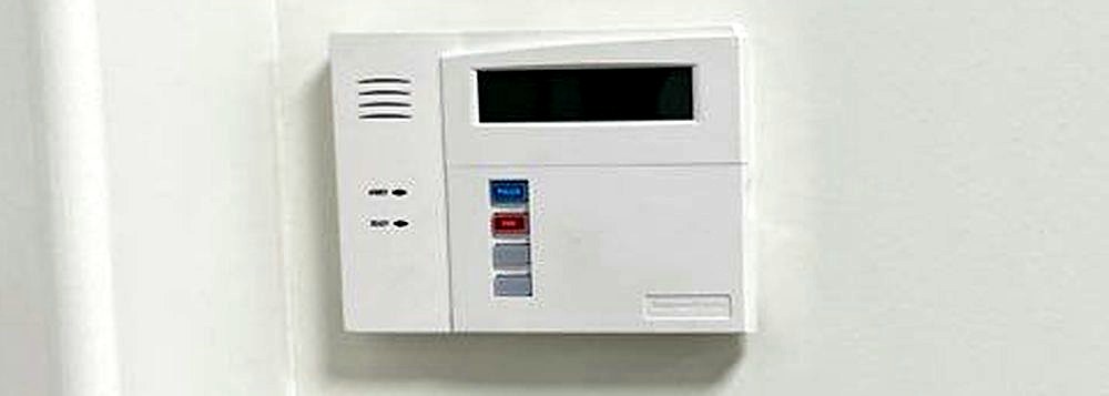 Resideo alarm panel wiring installation with Alarm.com commercial alarm system Michigan — commercial alarm installer — Michigan Security Systems