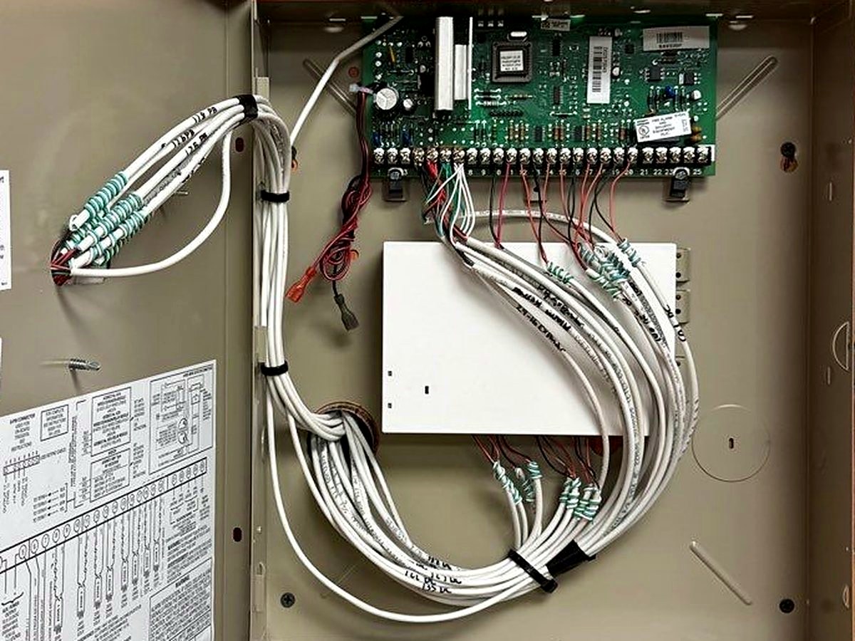 Resideo commercial alarm panel wiring installation with Alarm.com integration Mount Clemens Michigan — professional commercial alarm system installer Macomb County — Michigan Security Systems