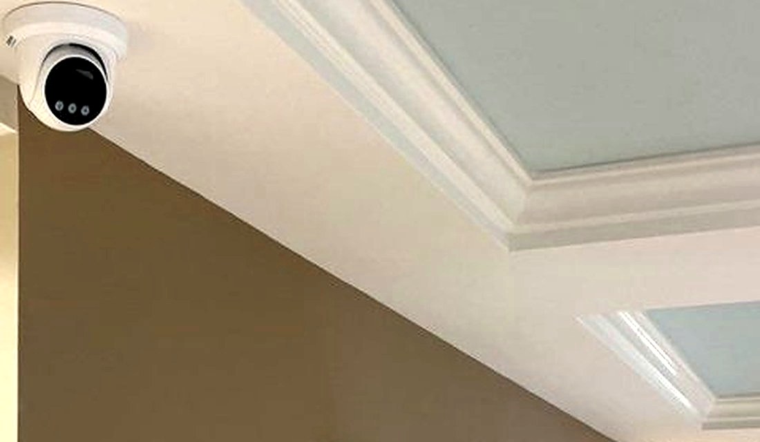 Turret security camera covering a guest corridor at the Best Western hotel in Port Huron, Michigan, part of full-property camera coverage installed by Michigan Security Systems