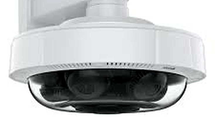 Commercial exterior Uniview dome security camera wall-mounted on a building, installed by Michigan Security Systems in Michigan